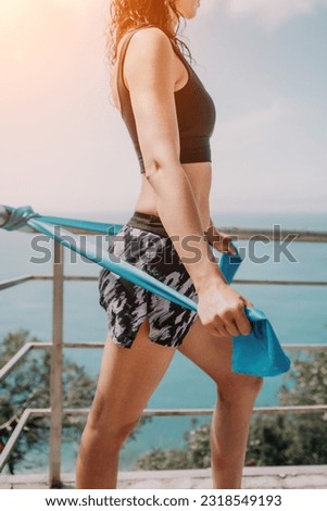 Woman sea pilates. Sporty happy middle aged woman practicing fitness on beach near sea, smiling active female training on yoga mat outside, enjoying healthy lifestyle, harmony and meditation.