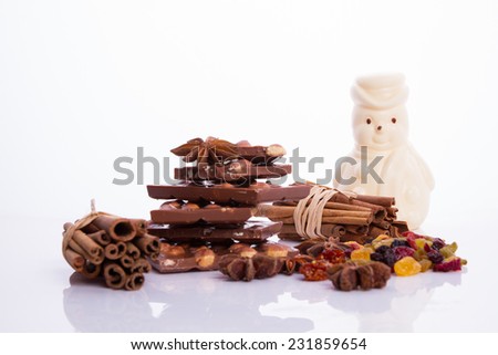 Snowman with white chocolate on a white background, dessert, sweets,