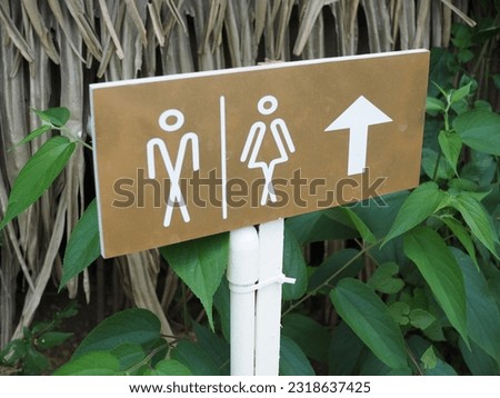 Men's and women's restroom sign