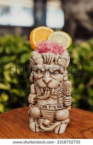 Tropical Rum and Fruit Cocktail Served in a Tiki Glass
