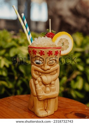 Tropical Rum and Fruit Cocktail Served in a Tiki Glass
