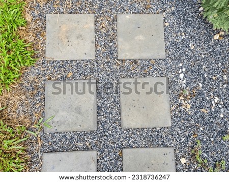 Walkway on the stone floor in the garden.