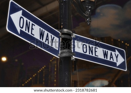 One Way Signs Sticked to Lampposts, Indonesia, Cilegon June 17, 2023