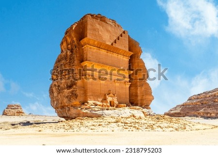 Entrance to the ancient nabataean Tomb of Lihyan, son of Kuza carved in rock in the desert,  Mada'in Salih, Hegra, Saudi Arabia Royalty-Free Stock Photo #2318795203