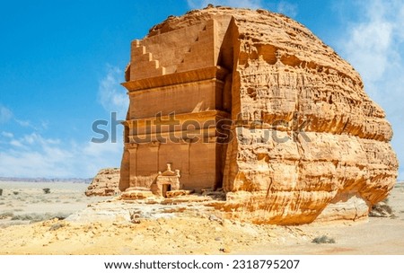 Entrance to the ancient nabataean civilization Tomb of Lihyan, son of Kuza carved in rock in the desert,  Mada'in Salih, Hegra, Saudi Arabia Royalty-Free Stock Photo #2318795207
