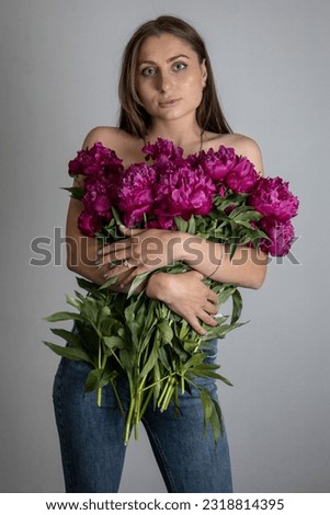 beautiful young girl with flowers.