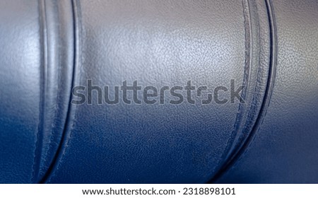 Leather background. Blue Leather. Background photo: stitched lines, leather interior, leather chair.