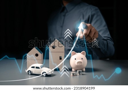 asset, piggy bank, financial, banking, finance, investment, currency, profit, money, wealth. point at graph to take benefit my position of invest. real estate and asset is currency wealth. growth.