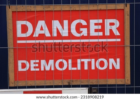 Danger Demolition warning sign at a building site