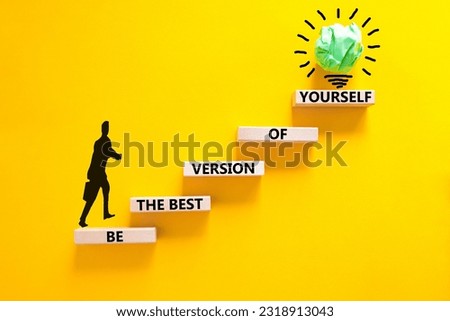 Motivational inspirational symbol. Concept words Be the best version of yourself on wooden block. Beautiful yellow background Businessman icon. Business motivational inspirational concept. Copy space. Royalty-Free Stock Photo #2318913043