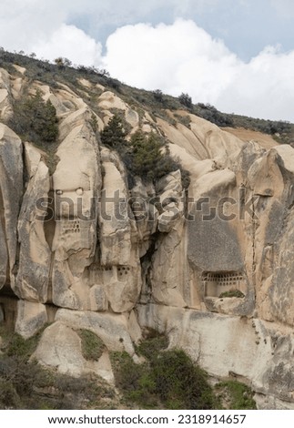 A picture of the rocky facades of the Goreme Historical National Park near the Goreme Open Air Museum.