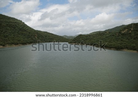 The beauty of the nature of the mountains, the sky, the water, the greenery, the trees