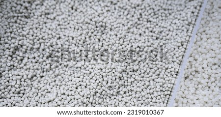 PCR HDPE and PP resin. Post-consumer recycled plastic resin. Sustainable packaging. Eco-friendly plastic. Polypropylene and polyethylene pellets industry. Sustainable material. Recycled polymer. Royalty-Free Stock Photo #2319010367