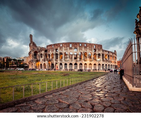 Colosseum in Rome at sunset, Italy Royalty-Free Stock Photo #231902278