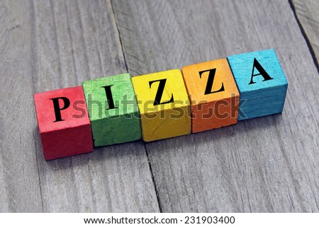 concept of pizza word on wooden colorful cubes