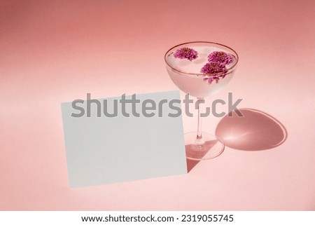 Pink invitation card mockup champagne glass flower inside