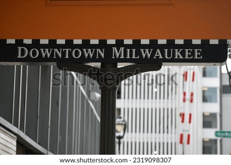 Downtown Milwaukee banner text sign on street 