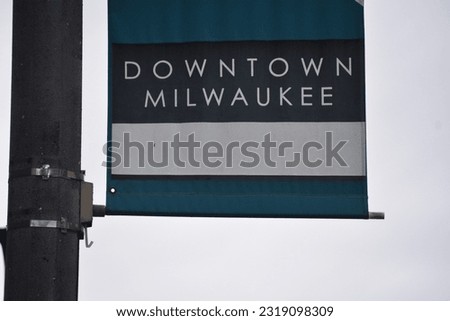 Downtown Milwaukee banner text sign on street 