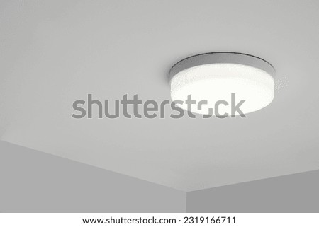 White modern lighting on ceiling in room Royalty-Free Stock Photo #2319166711
