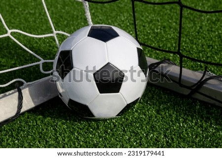 Symbol image: Football on an empty football field 
