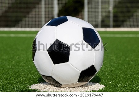 Symbol image: Football on an empty football field 