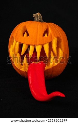 spooky jack-o'-lantern with a tongue for Halloween