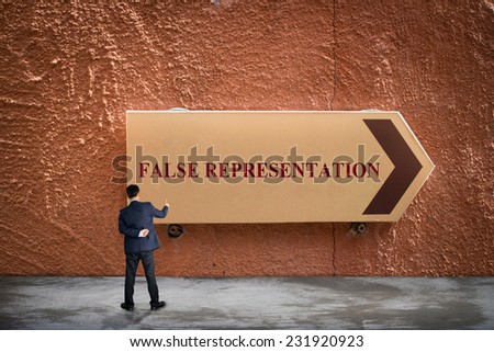 Businessman writing FALSE REPRESENTATION Royalty-Free Stock Photo #231920923