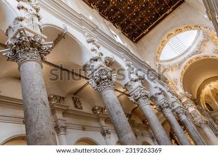 
Four of the most beautiful churches in Lecce: Cathedral, Santa Croce, San Matteo, Santa Chiara. Details, frescoes, twisted columns and statues. Decorations of Lecce Baroque. View of cathedral crypt.