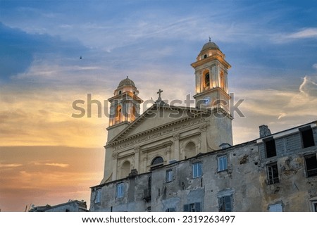Bastia in Corsica, the saint-jean-baptiste church in the old harbor, sunset Royalty-Free Stock Photo #2319263497