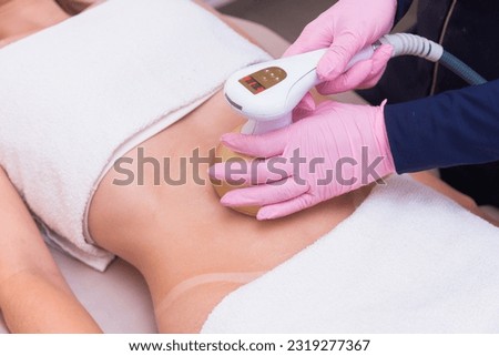 close-up photo of a woman's belly, photo of aesthetics, procedures on the abdomen. beauty clinic. ultrasound, slimming. weight loss.