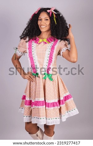 brazilian woman wearing typical clothes of festa junina, arraial, festa de são joão.