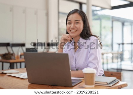 Accountant woman working on laptop and do document, tax, exchange, research, accounting and Financial advisor concept Royalty-Free Stock Photo #2319288321
