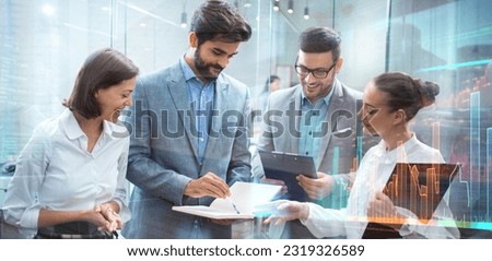 Diversity business team planning strategy and reviewing data report. Business, technology and stock market concept. Double exposure photo with digital charts, statistics and graph analytics.