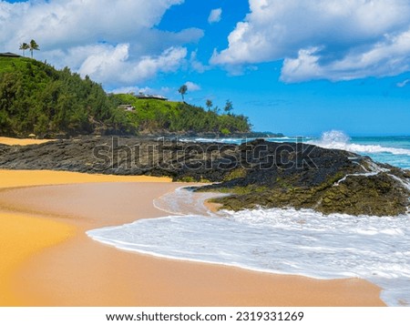 Waves Crash Over Exposed Lava Reef, Kauapea Beach, Kauai, Hawaii, USA Royalty-Free Stock Photo #2319331269