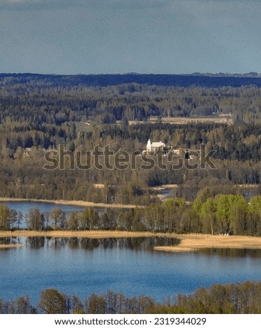 Spring landscape by lake  Ežezers Latvia, in the countryside of Latgale.