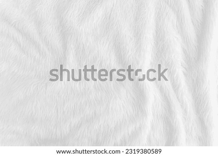 Fur background with white soft fluffy furry texture hair cloth of sheepskin for blanket and carpet interior decoration Royalty-Free Stock Photo #2319380589