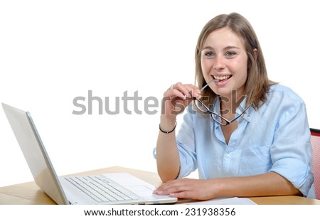 a pretty young secretary in his office smiling at the camera on the white background