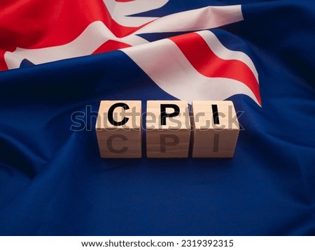 Consumer Price Index concept. Wooden cubes with the letters CPI on the Australia flag background. Royalty-Free Stock Photo #2319392315