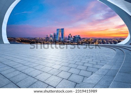 Empty floor and modern city skyline with building at sunset in Suzhou, China. high angle view. Royalty-Free Stock Photo #2319415989