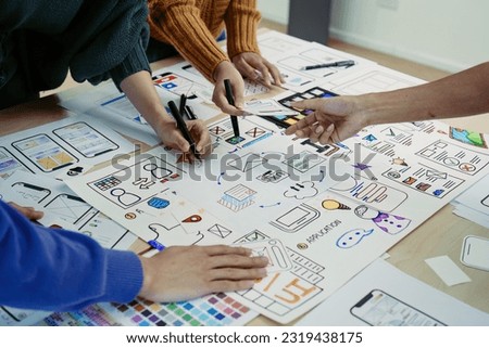 Team of Creative Web, Graphic Designer planning, drawing website ux ui app for mobile phone application and development template layout, process to developing prototype wireframe Royalty-Free Stock Photo #2319438175