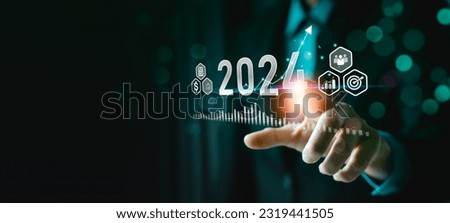 Business growing in 2024. analytical businessman planning business growth 2024, strategy digital marketing, profit income, economy, stock market trends and business, technical analysis strategy Royalty-Free Stock Photo #2319441505