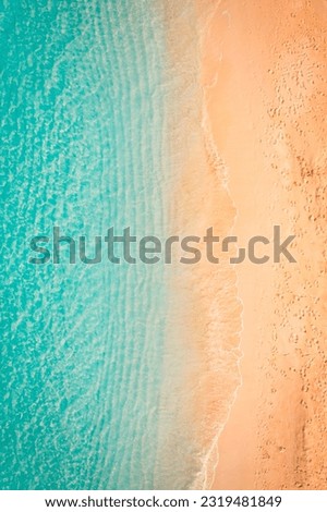 Relaxing aerial beach landscape, summer vacation holiday Mediterranean. Waves surf with amazing blue ocean lagoon, sea shore, coastline. Tranquil aerial drone top view. Peaceful bright beach, seaside Royalty-Free Stock Photo #2319481849