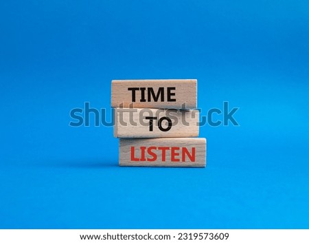 Time to listen symbol. Wooden blocks with words Time to listen. Beautiful blue background. Business and Active listening concept. Copy space.