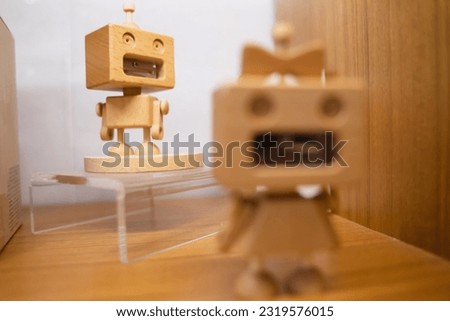 Pencil sharpener in the form of a wooden robot. DIY idea. Recycled materials.