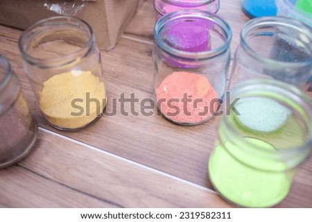 A set for children's creativity. Pictures and sand