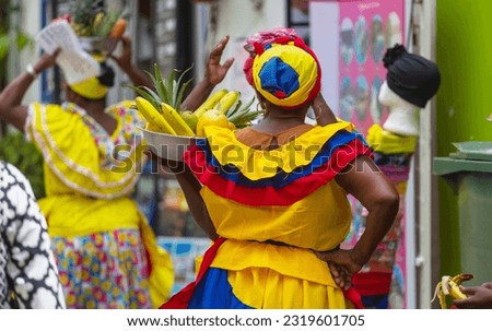 Traditional fruit street vendors in Cartagena de Indias , Colombia Royalty-Free Stock Photo #2319601705