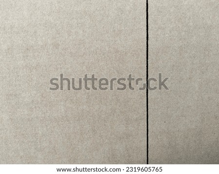 Light brown background with black lines on the sides.