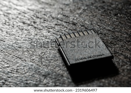 SD memory card on wooden table