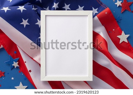 Labor Day in USA concept. Above view photo of empty wooden frame surrounded by white, blue and red star-shaped sparkles and american flag on blue isolated background with copy-space