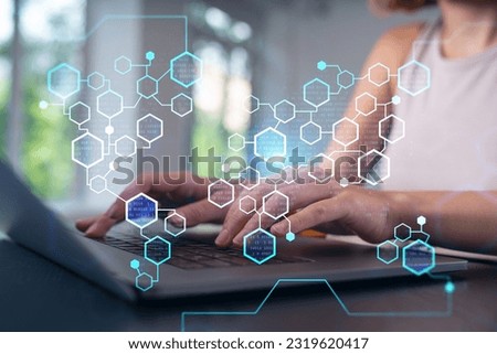 Woman typing on laptop at office workplace in background. Concept of working process, internet surfing, online business education. Student send e-mail. Close up view. Blockchain icons